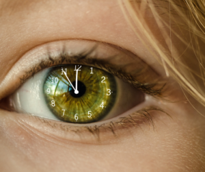Clock superimposed on eyeball
